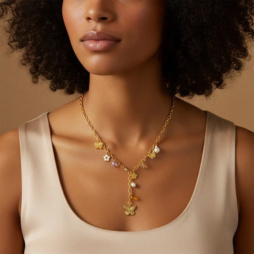 Lola – Collier doré en Y papillon