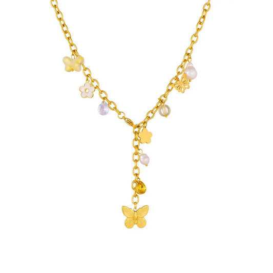 Lola – Collier doré en Y papillon